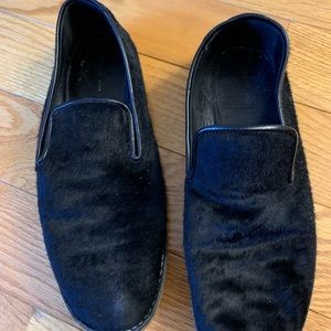 Black gently worn Celine calf hair slip ons